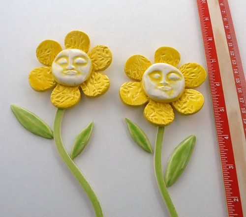 2 Yellow flowers with seperate stem and leaves