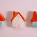 Light blue and white with red roofs