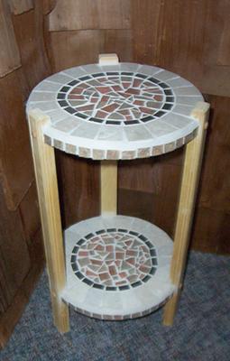 A mosaic round table for plants