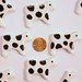 White with black spots
