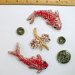 2 handmade koi fish, flowers and coins