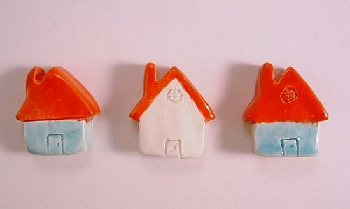 Light blue and white with red roofs