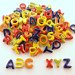 2 full sets of alphabet tiles, 52 letters