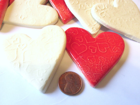 6 handmade embossed white and red heart tiles