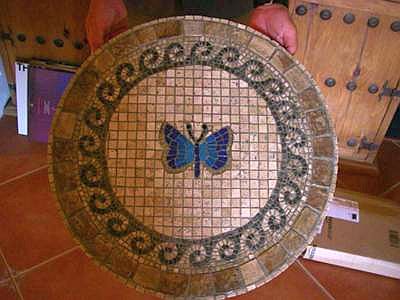 mosaic butterfly table made from travertine and glass tiles